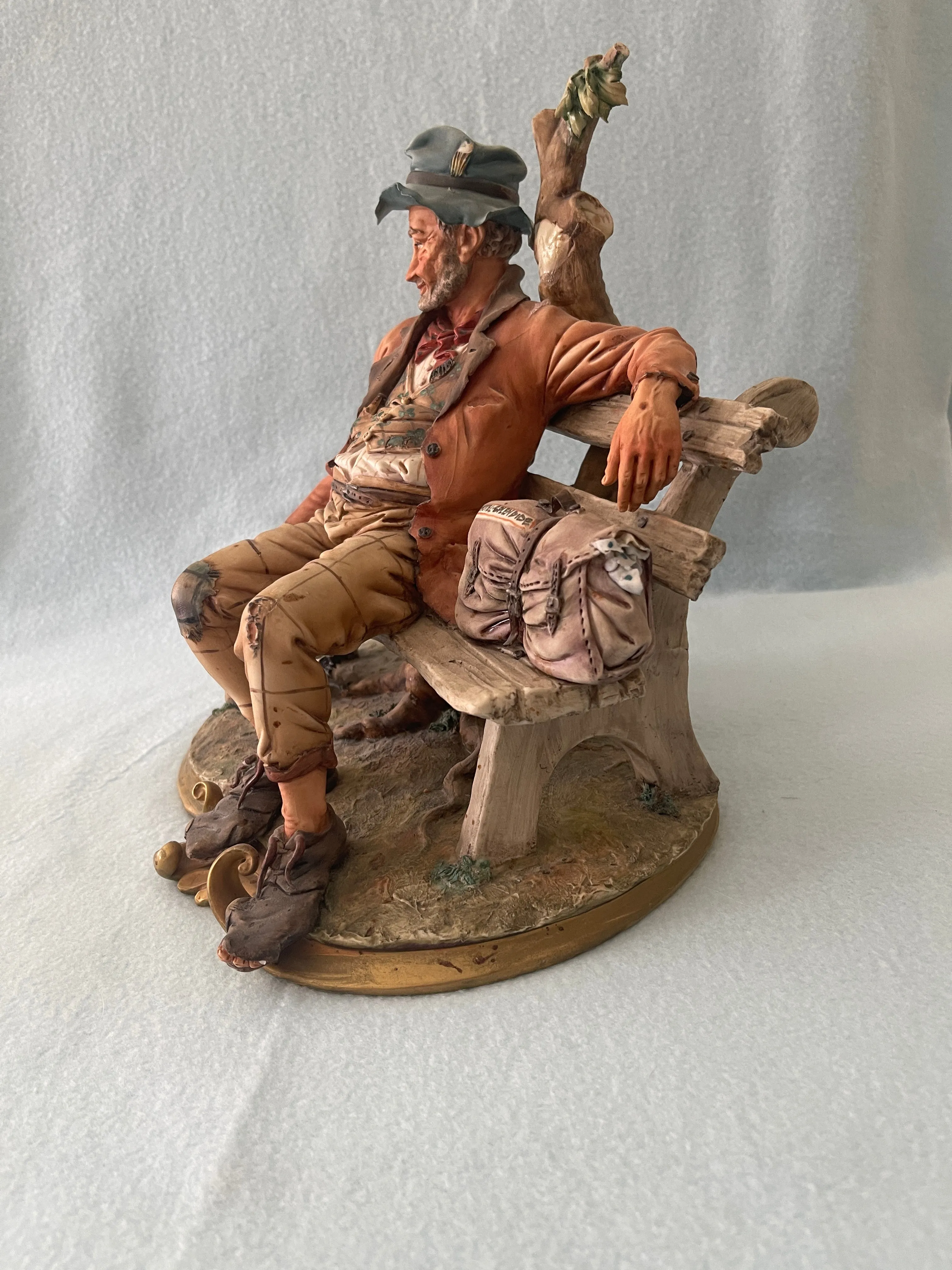 Capodimonte Tramp on Bench Figurine by Volta