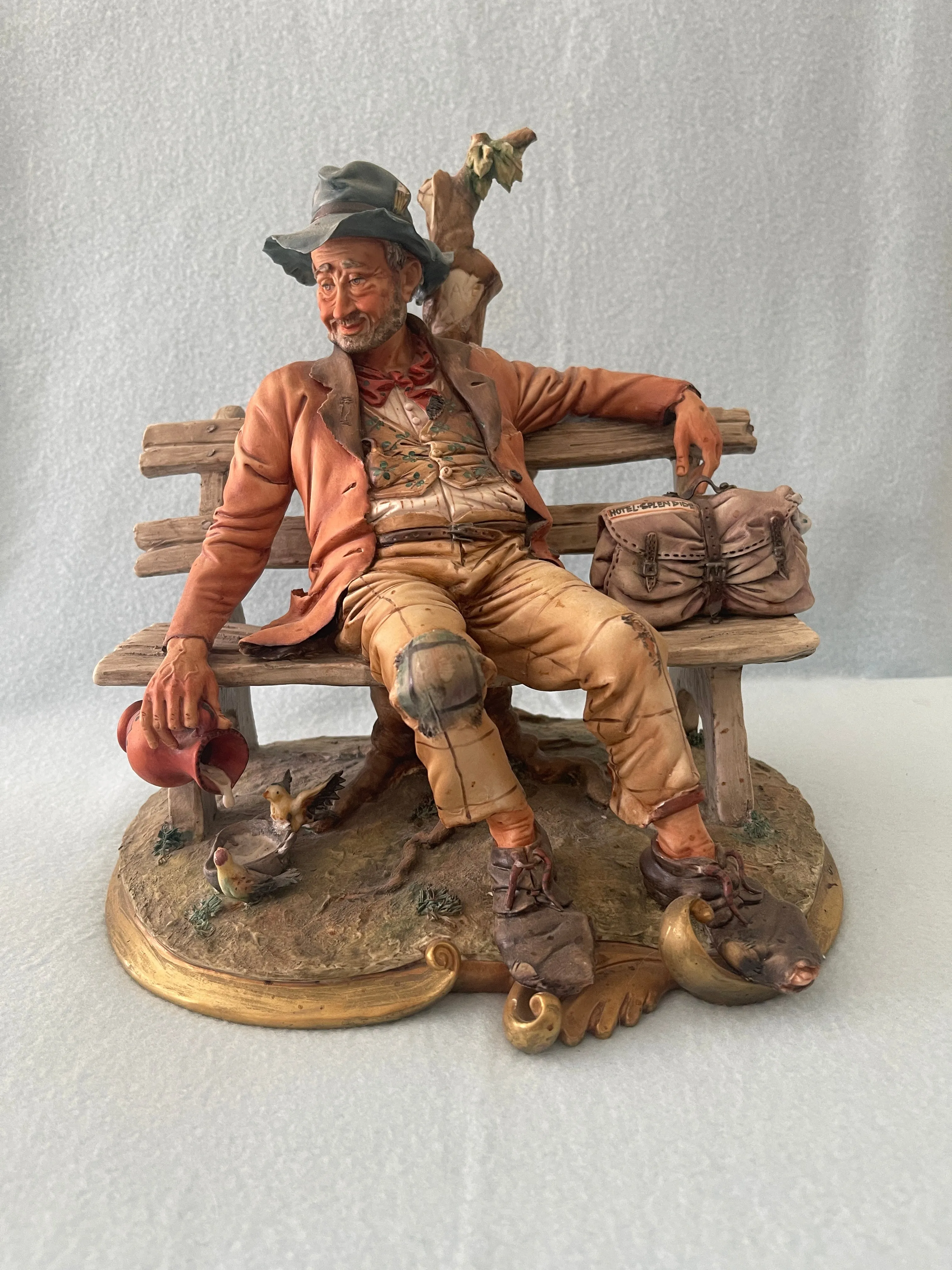 Capodimonte Tramp on Bench Figurine by Volta